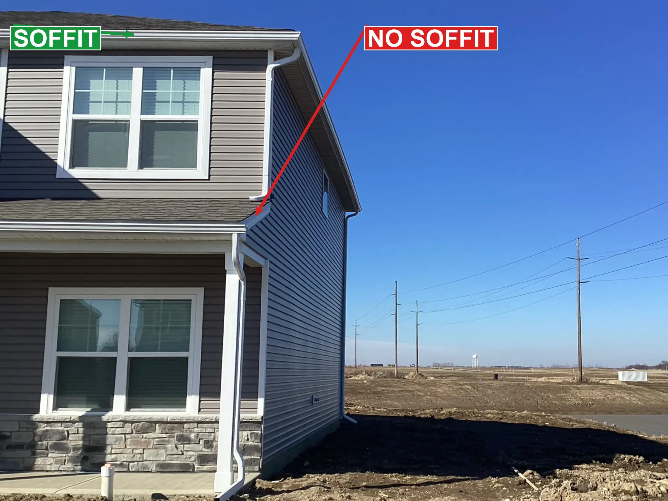 Same house showing soffit overhang on the front face vs no soffit on the gable end