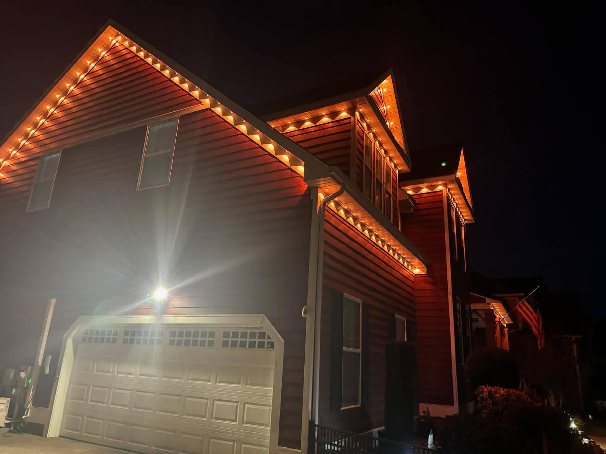 Govee permanent outdoor lights at twilight with soft color glow against the evening sky