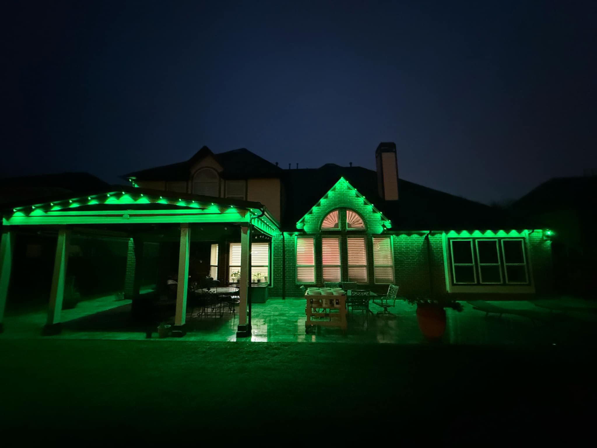 Govee permanent lights set to a vivid RGB color display across the entire roofline