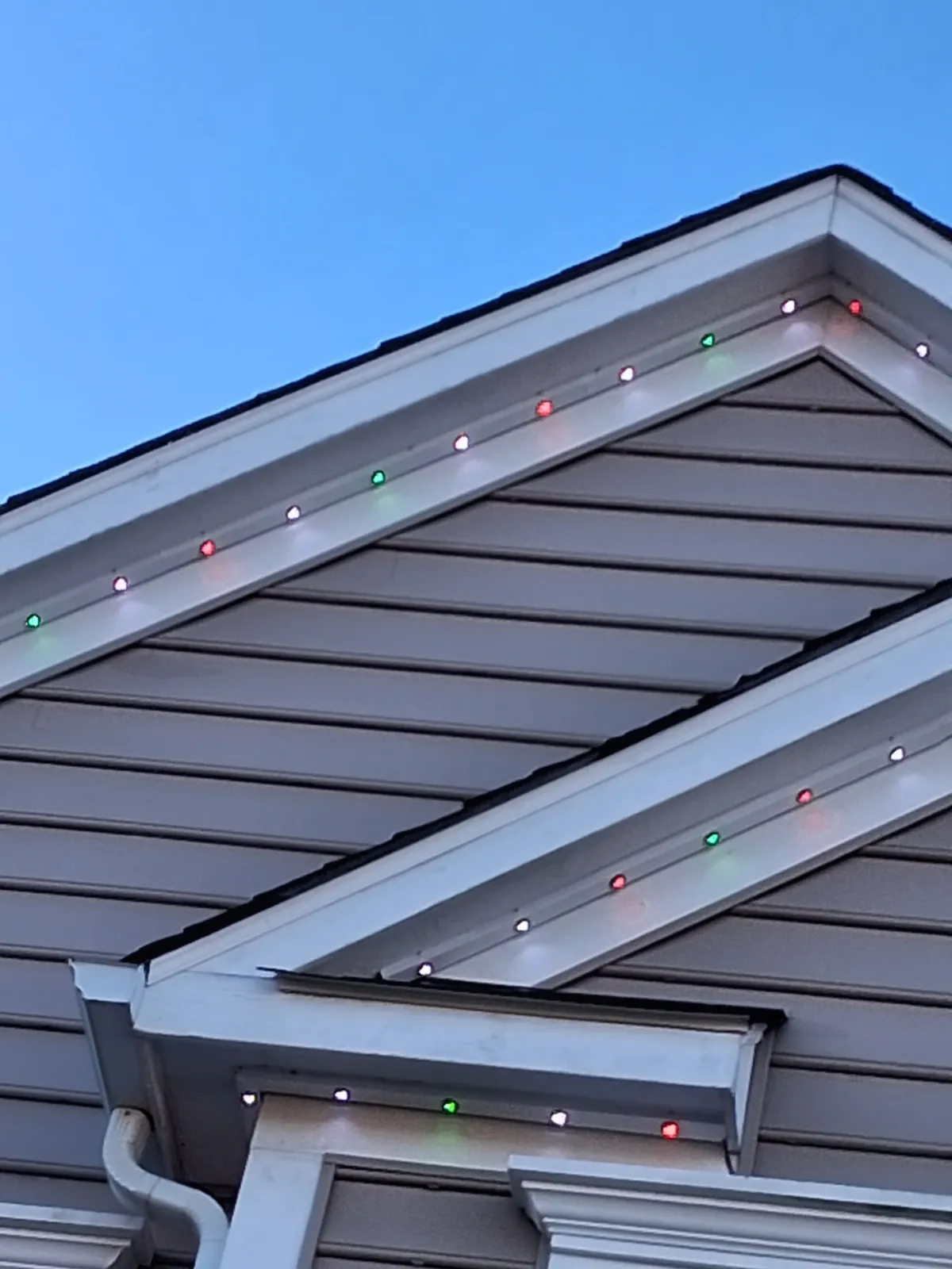 Permanent lights daytime closeup showing seamless track integration